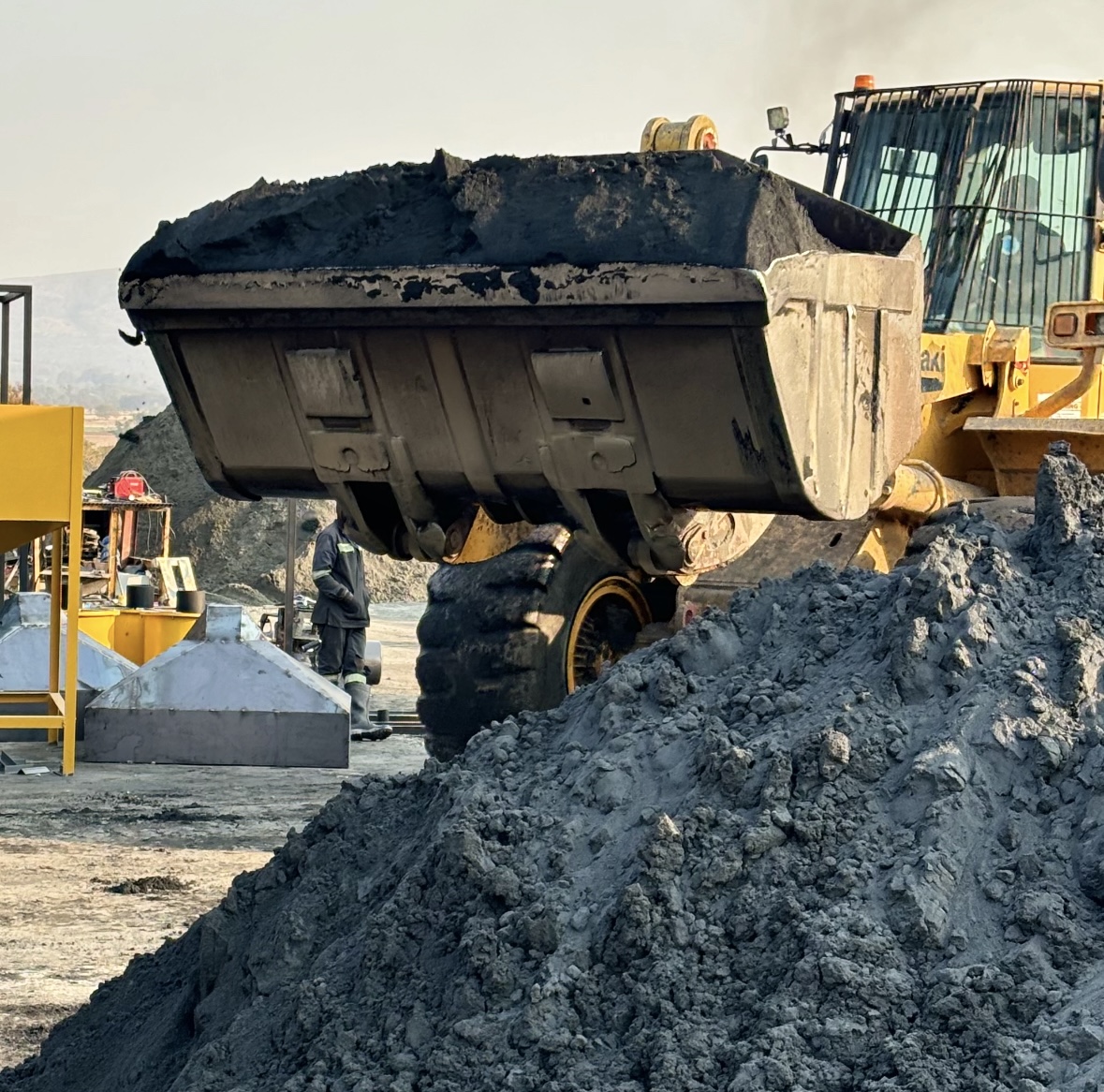 Front-end loader loading material - North West